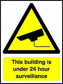 Building Under CCTV Signs
